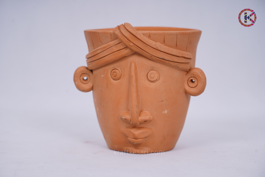 Terracotta Man face miniature planter (Clay )