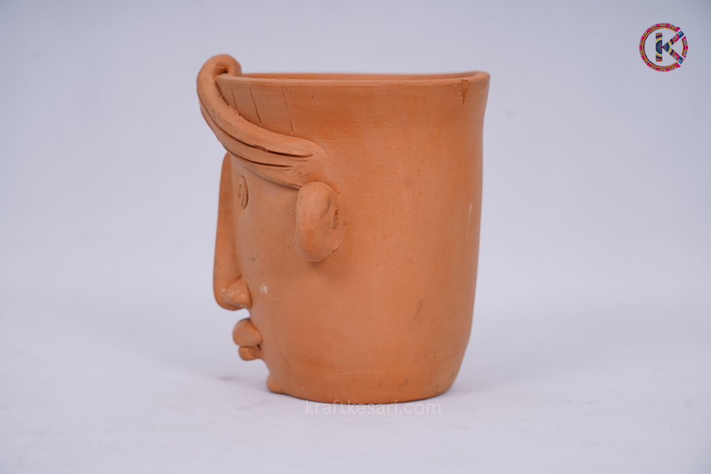 Terracotta Man face miniature planter (Clay )